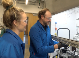Professor Phillip Christopher and a graduate student discuss equipment inside his state-of-the-art lab.